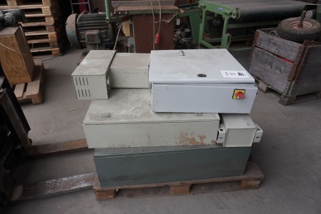 Pallet with control boxes with entrails