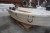 Plastic boat, brand: PIONER, with outboard motor
