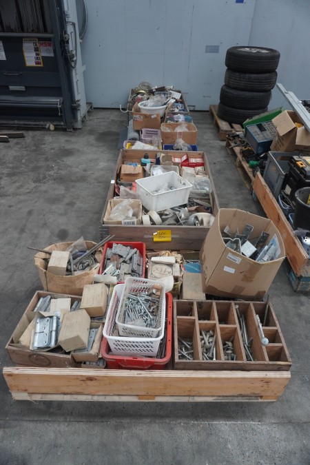 4 pallets with various electrical parts, fittings, screws etc.