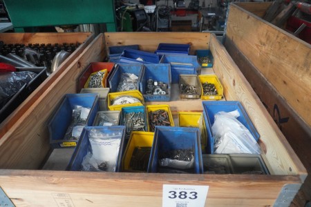 Pallet containing various screws, bolts, nuts, etc.