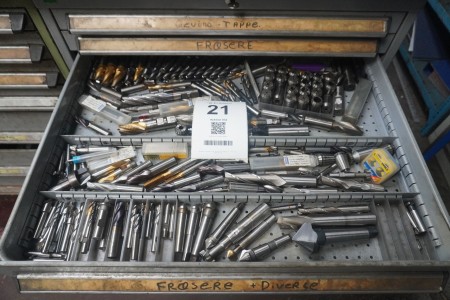 Contents in 1 drawer of various Cutting tools and clamps.