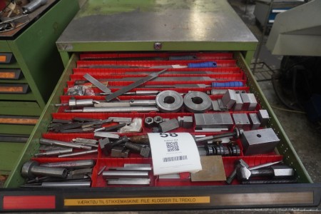 Contents in 4 drawers of various tools for stitching machine, drill, spacers etc.