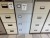 2 filing cabinets with key.