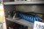Steel shelf with content of various clamping tools + assortment shelves with content