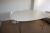 White elliptical table, dual + 3 white chairs