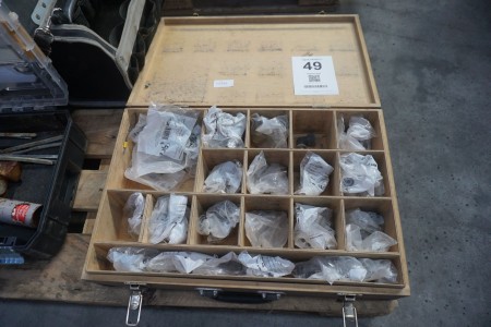 Assortment box with various fittings