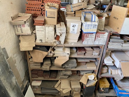 Large batch of mixed tiles on pallet