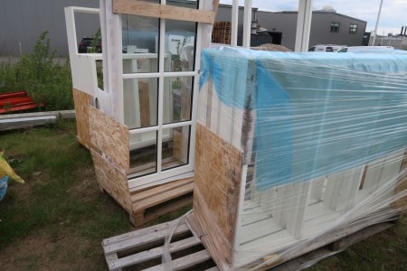22 pcs. window frames in ass. size, and 1 pc. door without frame
