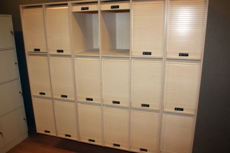 Locker with 18 lockable storage compartments