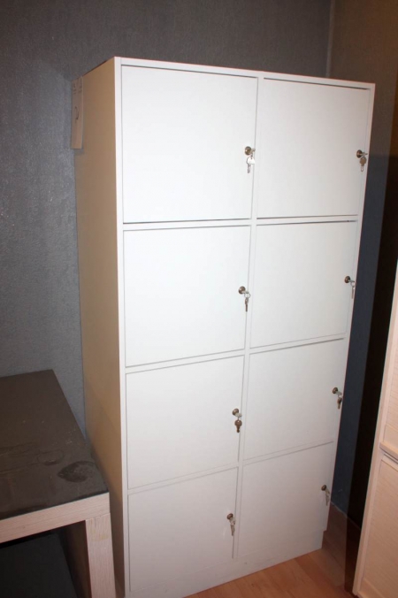 Locker with 8 lockable storage compartments