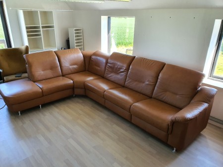 Real leather sofa, in cognac color, new,