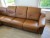 Rigtig læder sofa, i cognac farve, fremstår som ny.