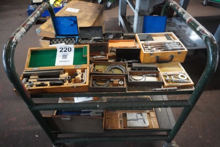 Large batch of measuring tools on top of trolley