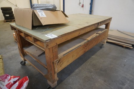 Wooden work table on wheels