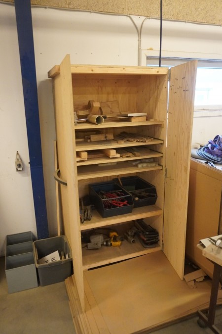 Wooden workshop cabinet with contents