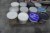 12 buckets of mixed paint