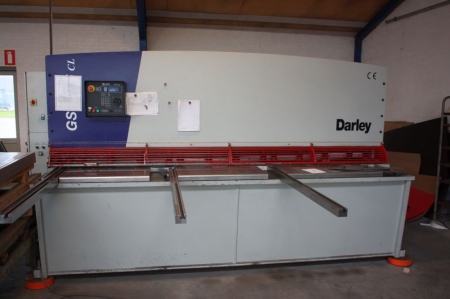 Guillotine, Darley GS 3106 CL, year  2004. Max capacity: 6mm. Working length: 3050mm. Power: 16.5 kW. Machine weight: 7300 kg. Motorized back gauge. Sheet Catcher. Extra knives and tool. Control: Darley