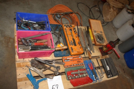 Pallet with various hand tools, hydraulic jack, weed burner handle with hose