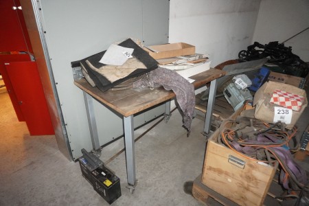 Work table on wheels with contents