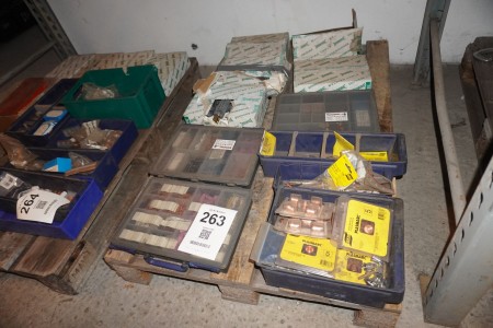 Pallet with various spare parts for welders
