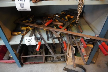 Contents on 1 shelf & under shelf of various screw clamps, weights etc.