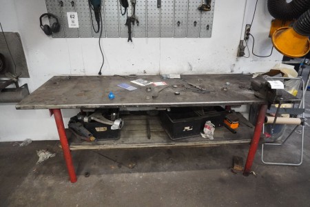 Metal workshop table with contents
