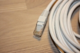 Network Cable with plugs, CAT 5e patch, white, approx. qty. 21600 x 1 meter, individually packed in plastic bags. Archive photo