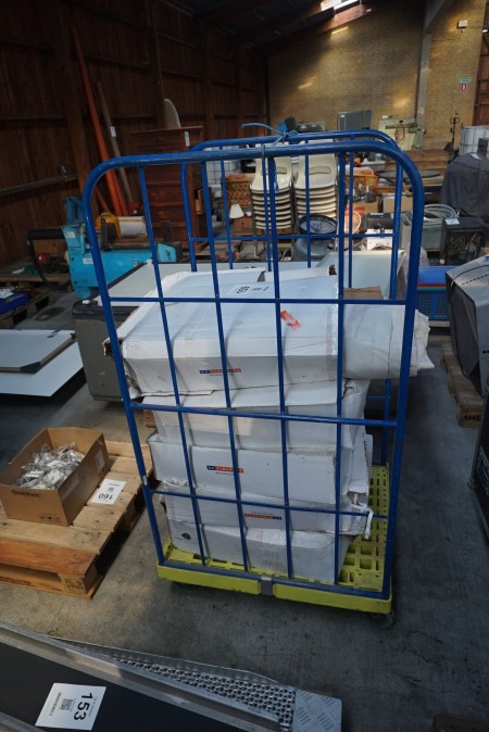 metal cage on wheels with batch ventilation bags