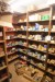 Contents in 6 sections of shelves of various screws, nails, diving screws, fittings, washers, etc.