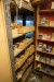 Contents in 6 sections of shelves of various screws, nails, diving screws, fittings, washers, etc.