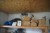Contents on top of shelf of various roof tile binders, work lamp, etc.,