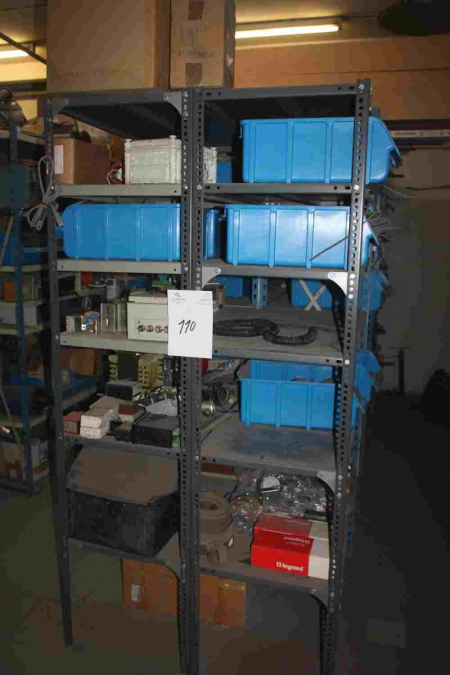 8 section steel rack containing various electrical appliances, fluorescent lamps, etc.
