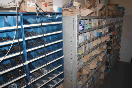 3 section steel shelving + 4 section range rack containing: screws, bolts, nuts, etc.