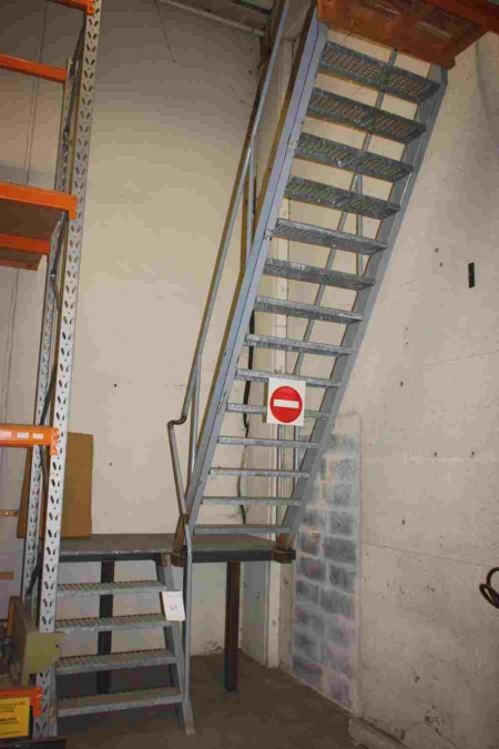 Steel staircase with 180 degrees landing. 4 steps to the landing. 14 steps from the landing to the top