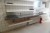 Arbejdsbord i rustfri stål + diverse hylder & kogeplade