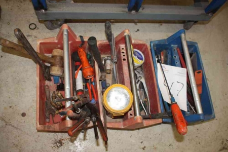 3 tool boxes containing