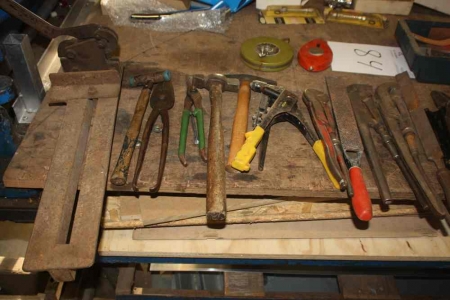 Various hand tools on table