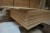 2 pallets containing various wooden elements for the production of cabinets, drawers, etc.