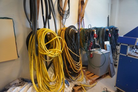 Contents on the wall of various hoses, wires, etc.