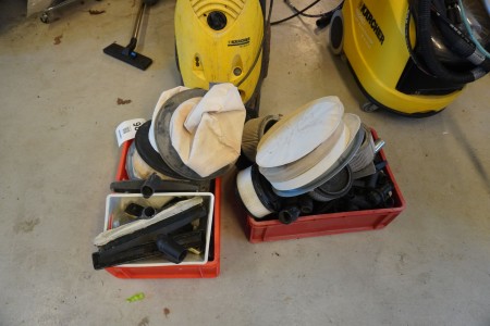 2 boxes with various parts for vacuum cleaner