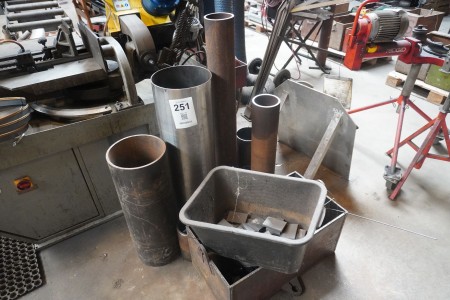 Various pipes + iron box with contents