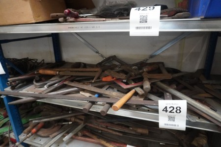 Shelf contents of various hand tools