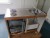 Kitchen table with 2 burners, refrigerator & faucet