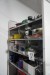 4 shelves with various lights, spare parts, tools, etc.