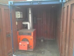 10 " container equipped with 100 kW oil furnace with control / chimney etc.