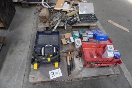 Pallet with various accessories for fresh air mask, nails, screws, hand tools, etc.
