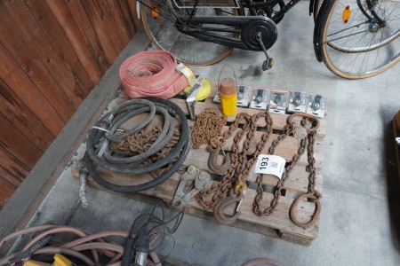 Pallet with various chains, straps, etc.