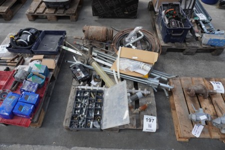 Pallet with various couplings, electric motor, copper pipes, etc.