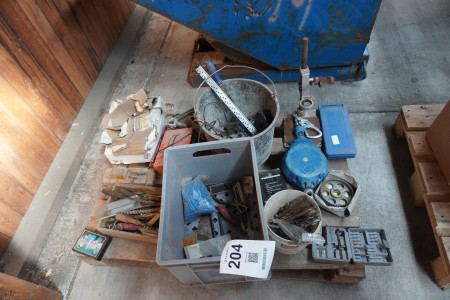Pallet with various hand tools, drills, screws, etc.