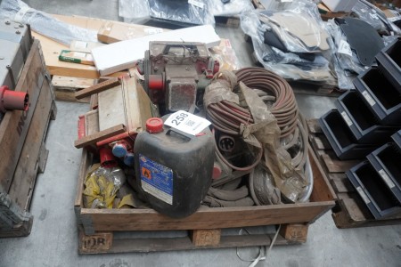 Pallet with various switchboards, cables, hoses, etc.